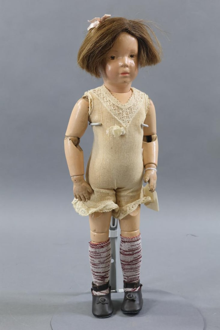 SCHOENHUT.: 16" Model No. 301 Schoenhut doll. This doll was made from November 1911 - 1924. She has the incised mark on the back of her torso, Replaced antique brown bobbed HH wig. Brown intaglio eyes. Dressed