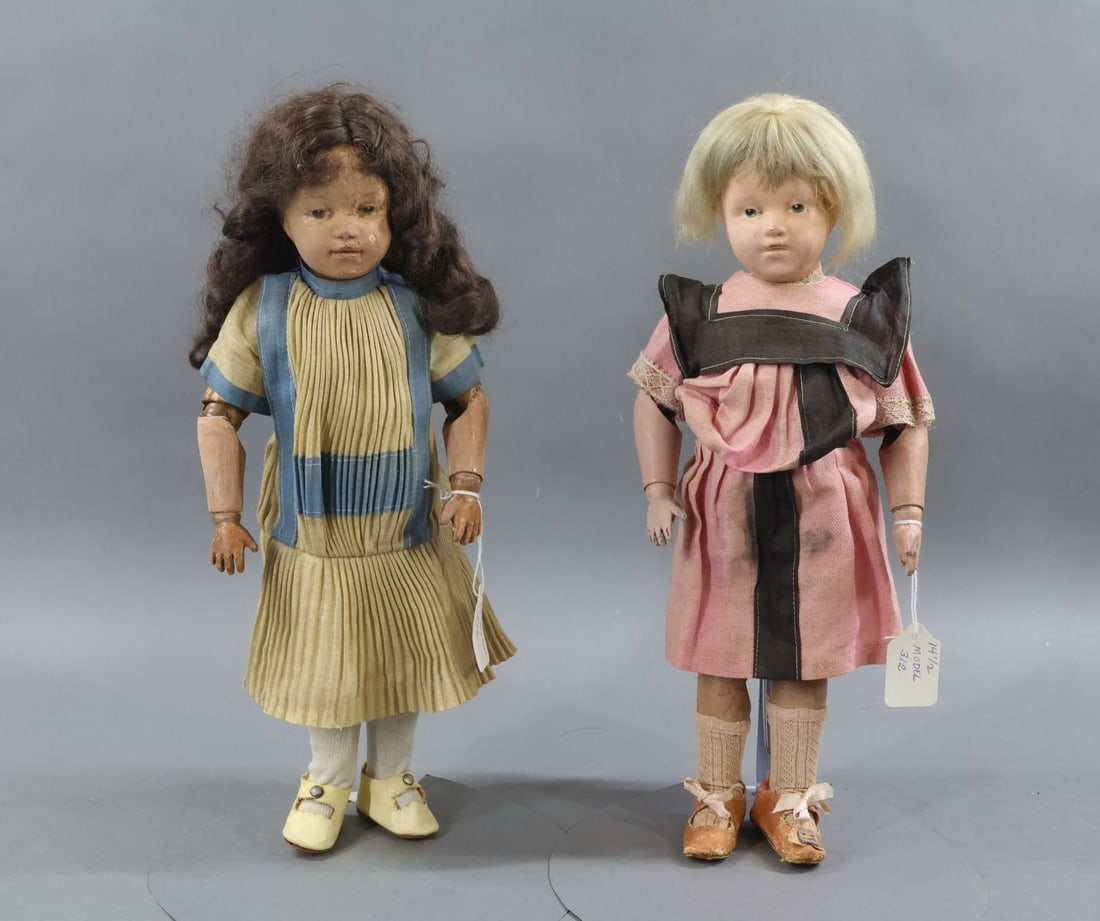 SCHOENHUT.: Pair of 14" Model No. 312 Schoenhut dolls. These were made from April 1912 to 1924 and 1917 to 1924 (depending on the original hair styles). Both dolls have intaglio eyes. No original clothing, they h