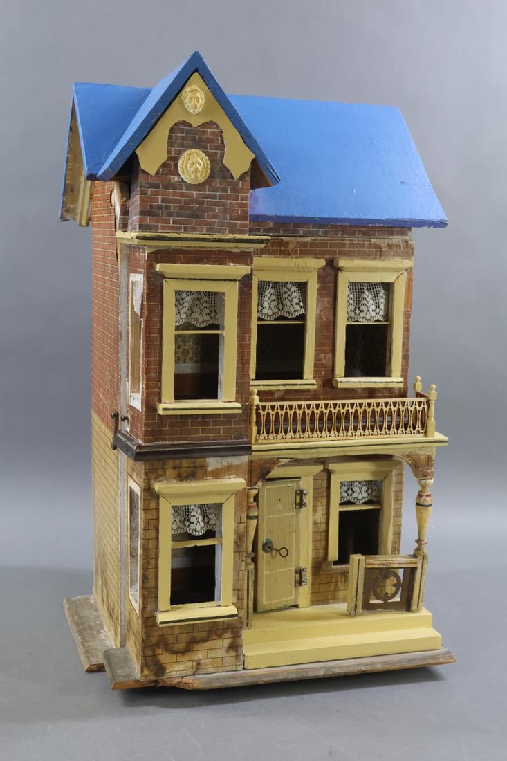 GOTTSCHALK DOLL HOUSE.: German GOTTSCHALK Blue Roof Doll House No. 2446. Ca. 1895. Both the exterior and interior retain many of the original details. The facade on this house displays red/white brick work on upper level,