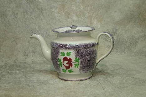 Spatterware Tea Pot.: Purple spatter tea pot with rose decoration. 6 1/4" t. Condition: Repaired spout and handle.