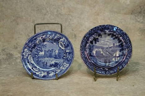 Two Staffordshire Cup Plates.: One Wood & Sons, blue transfer design of landscape with figures and grape and floral border. 4 1/2" dia.; the other is Clews, blue transfer design of landscape with figures and sailboat, foliate and