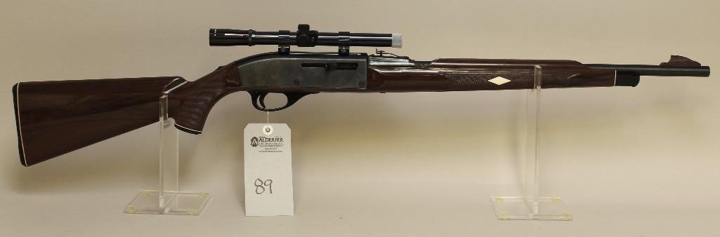 Remington Nylon 66 semi-automatic rifle.: Cal. 22. 19-1/2" bbl. SN A2308128. Blued finish on metal, excellent bore, left side of receiver shows two light scratches, plastic stock and forend show little to no handling marks. With a Bushne