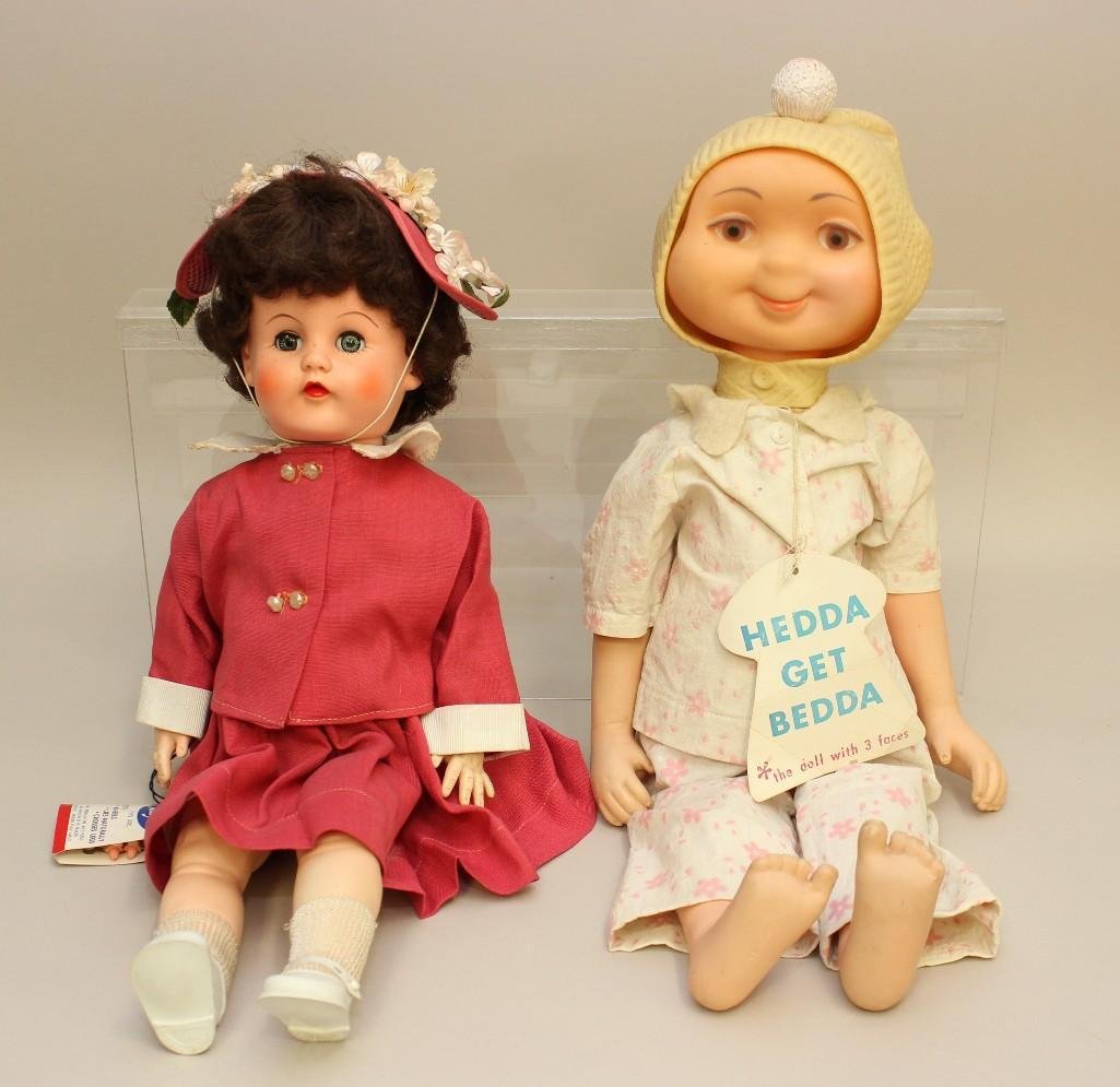 PAIR OF ALL ORIGINAL TAGGED VINYL DOLLS:: 19" JOLLY'S "MISS FLEXIE" & 20" AMERICAN DOLL & TOY CO.'S "HEDDA GET BEDDA" WHIMSIE WITH 3 FACES. Both of these dolls have their hang tags, neither are marked on