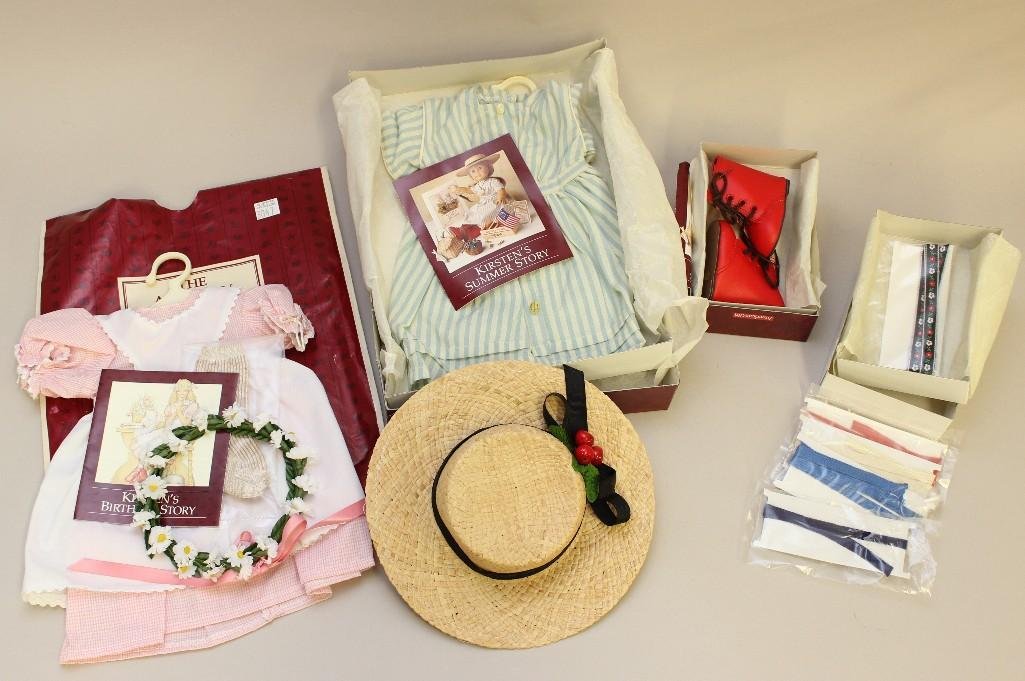 AMERICAN GIRL - LOT OF MIB/MIP "KIRSTEN" OUTFITS -: DRESS & HAT, RED BOOTS; "BIRTHDAY STORY" : APRON DRESS & DAISY WREATH; BOX OF HAIR RIBBONS.