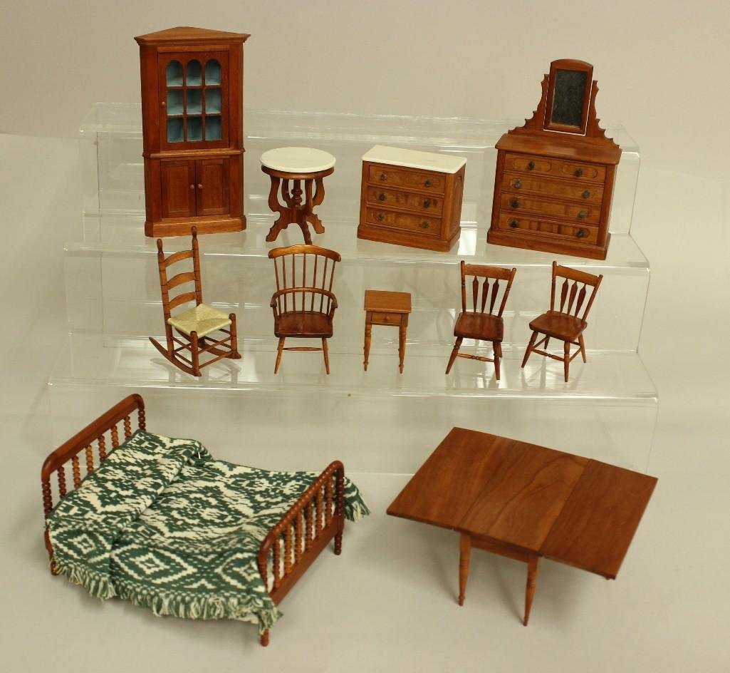 LOT OF SIGNED DOLL HOUSE FURNITURE WITH CHERRY FINISH.: All but (1) piece have the initials RG stamped into the wood. Spool bed with linens and an "overshot" bedspread. (3) Drawer chest with "marble" top. Dresser with (4) drawers and sw
