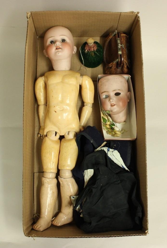 BODY PARTS -: 24" HEUBACH 250-6. KOPPLESDORF. GERMANY. ANTIQUE BISQUE HEAD DOLL; 12" CIR. C.M. BERGMANN HALBIG S&H 3 ANTIQUE BISQUE HEAD; BISQUE HEAD PIN CUSHION DOLL; MISC. ANTIQUE CLOTHING. Heubach