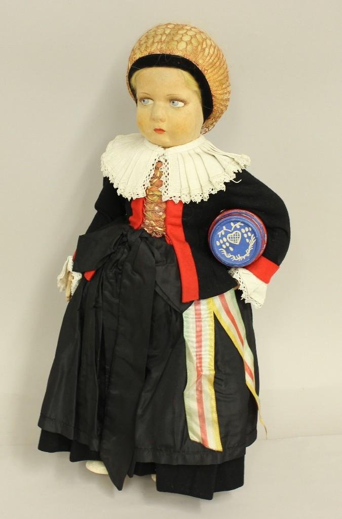 17 1/2"-18" ALL ORIGINAL TAGGED LENCI 1930's SERIES 300: DRESSED IN A GERMANIC REGIONAL COSTUME. Painted blue side glance eyes, blonde mohair wig with coiled braided bun, snood. Dressed in black wool felt fitted jacket over pleated skirt. Red felt trim