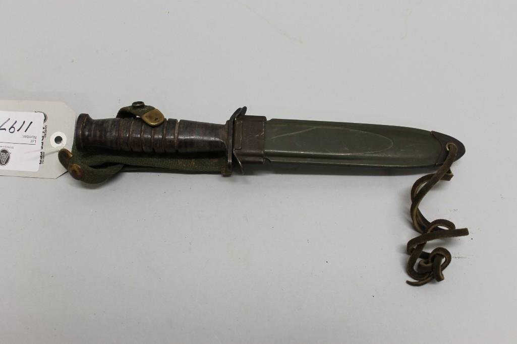 US WW II M 3 fighting knife.: US WW II M 3 fighting knife. Knife presents with stacked leather grip in very good condition with spear point type blade (6 1/2" length) retaining most of its original finish with evidence of sha