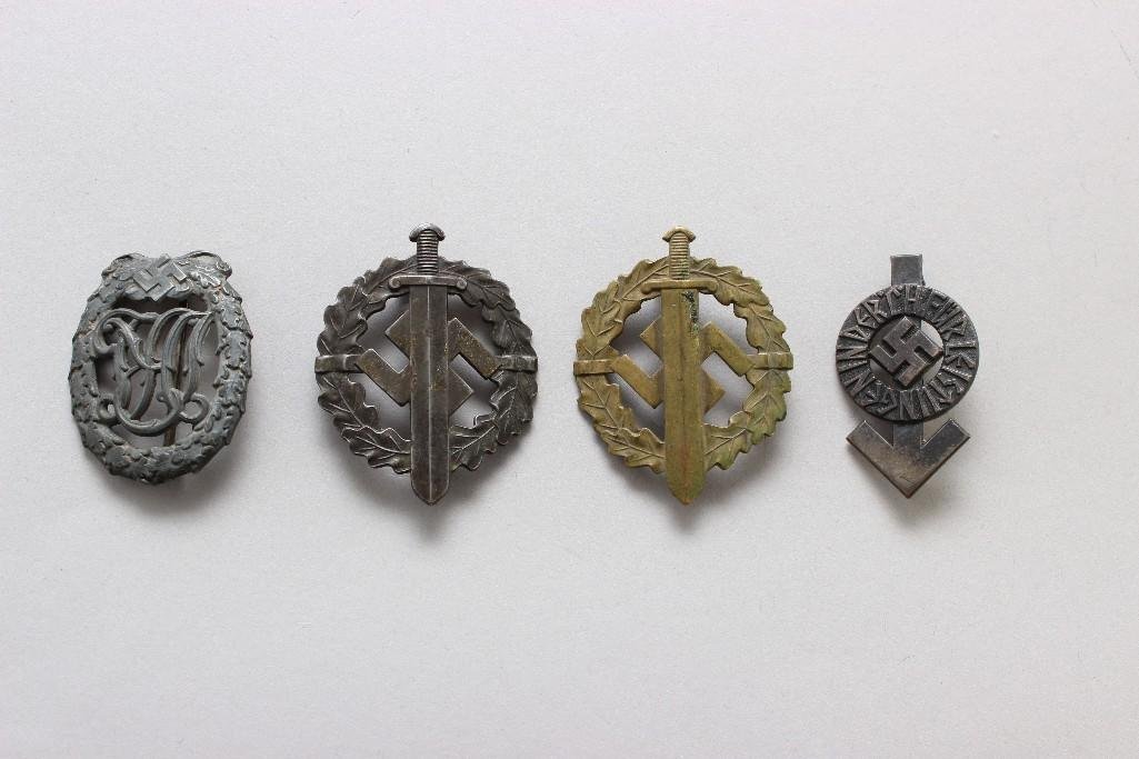 Grouping of German WWII Badges: Grouping of German World War II badges including 3 different sports badges and 1 Hitler Youth proficiency badge.