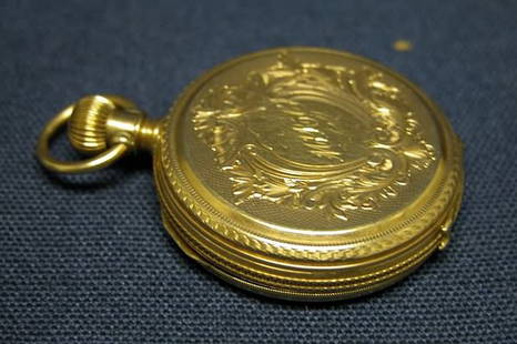 Pocket Watch.: Elgin National Watch Co., movement #2189784. Decorative case with monogram on front, design on back. Hunting case- C.W. MEG Co. #58842 in 14K yellow gold.