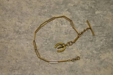 Watch Chain.: 14K yellow gold watch chain with unusual horseshoe watch. Key. Chain is 14" long. 25.7dwt.