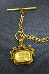 Watch Chain with Fob.: Victorian style pillbox revolving in fob, some denting. 18K yellow gold-filled chain.