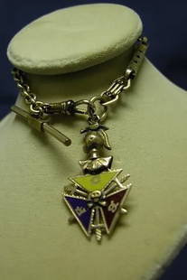 Watch Chain with Fob.: Gold plated fraternal medal on G.F. chain.