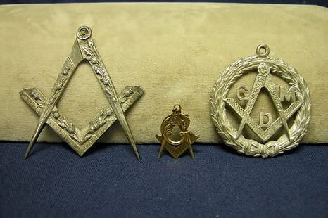 Three Pieces Masonic Jewelry.: Jewel and pendant: 1) Grand Master medal; 2) Square and Compass in silverplate; and 3) Square and Compass, 10K.