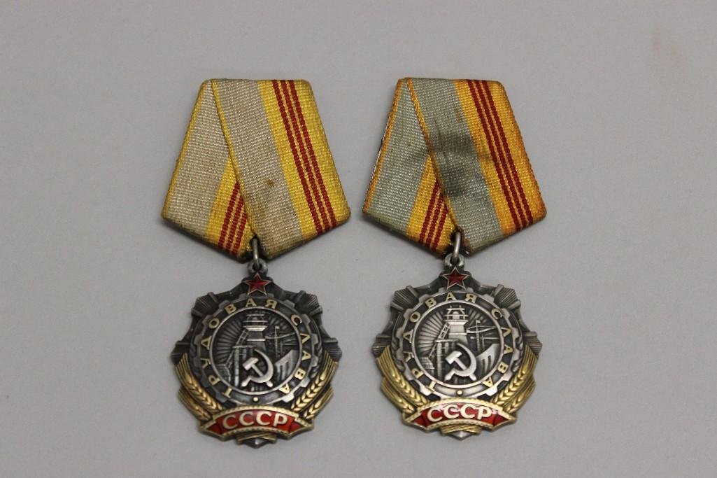 Pair of Soviet Orders of Labor Glory - Third Class: Pair of Third Class Orders of Labor Glory: 1.) Order of Labor Glory presents engraved number on reverse at bottom center "253662". Ribbon exhibits staining, 2.) Order of Labor Glory presents
