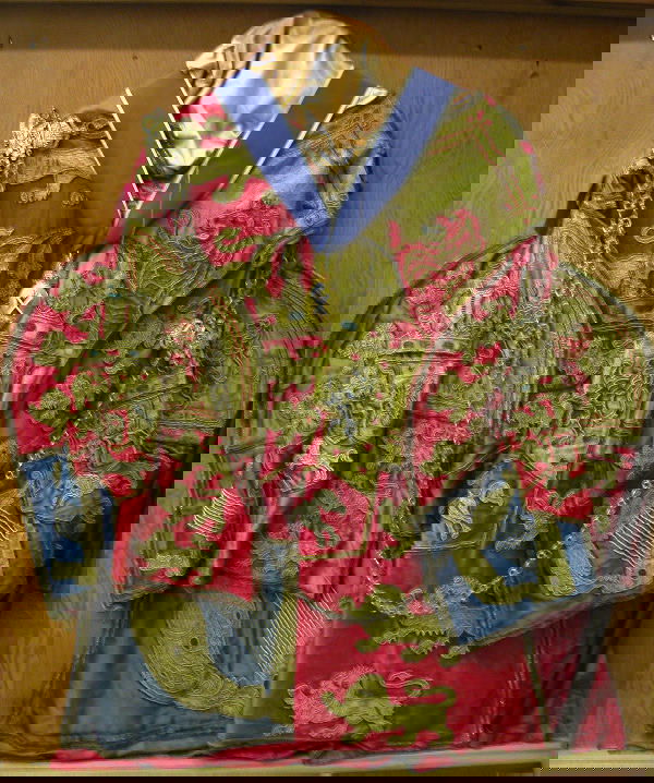 19th-Century British Footman's Coat.: Coat with bullion worked design featuring lions and coats of arms. Coat is sold with chain collar, baton, and medal. Whole grouping is displayed in case 40.5" x 39".