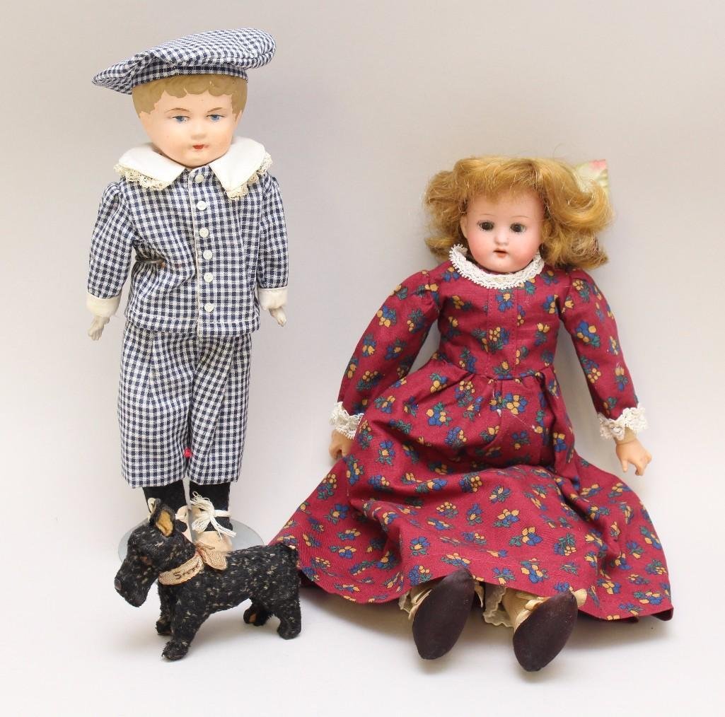 LOT: PAIR OF ANTIQUE DOLLS, GERMAN DOG. (1 of 4)