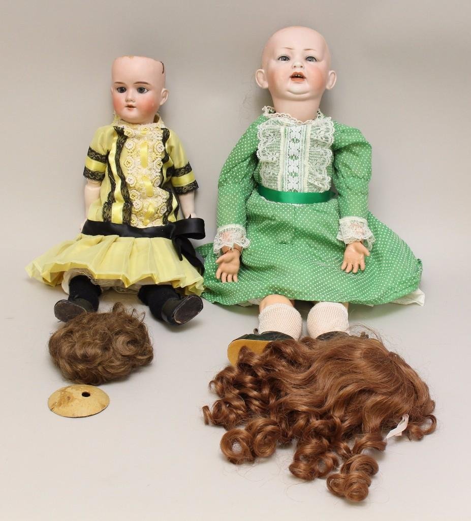 BODY PARTS: PAIR OF ANTIQUE BISQUE HEAD DOLLS. (1 of 3)