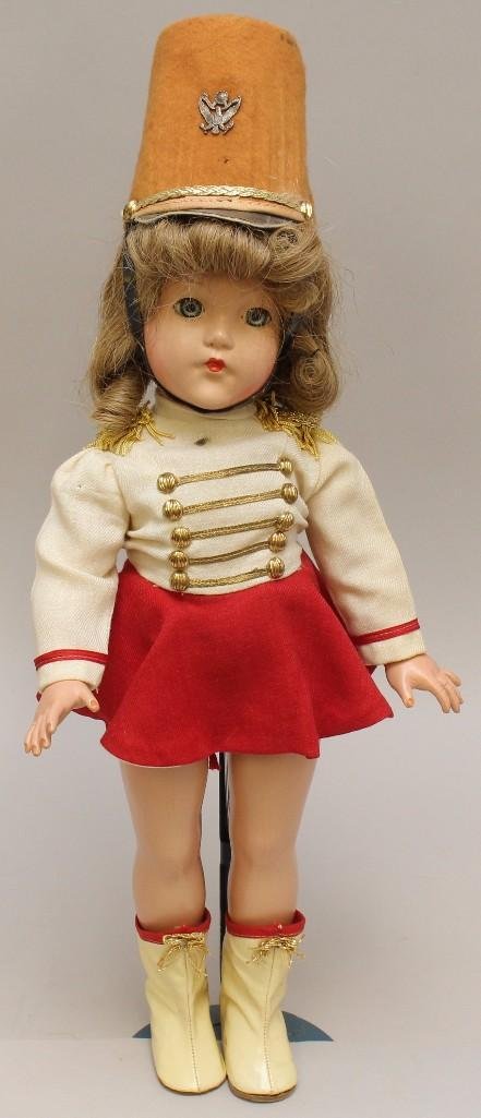 18" ALL ORIGINAL 1940-1949 EFFANBEE COMPOSITION "LITTLE: This is an original owner doll. Blue sleep eyes, uncombed brown human hair wig. Dressed in red/white wool Drum Majorette dress with attached panties. Gold soutache, button and braid trims. Red felt ha