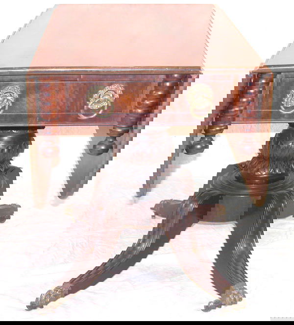 Drop-leaf Breakfast Table.: Federal walnut drop-leaf breakfast table, two drawers, carved turned pedestal on Duncan Phyfe four-leg base with casters, circa 1860, 29"t., 21"w. when closed, 48"w. open, 40"d. Condition: refinished.