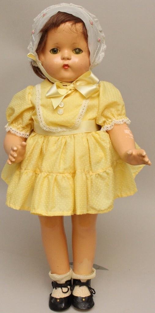 22" EFFANBEE COMPOSITION "PATSY LOU" DOLL.: Blue sleep eyes, replaced human hair wig. Dressed in replaced clothing, black oilcloth shoes, socks,. Vintage organdy bonnet. Condition: crazing, paint flaking. Touchup on both ankles.