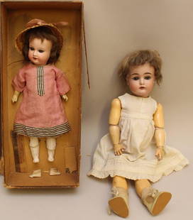 PAIR OF ANTIQUE BISQUE HEAD DOLLS: KESTNER 152 AND AM: Both dolls have sleep eyes, open mouths, mohair wigs. Doll 1) 17" C 1/2 Made in Germany 71/2 152 with papier mache ball jointed body. Dressed in antique petticoat, vintage shoes, socks. Condition