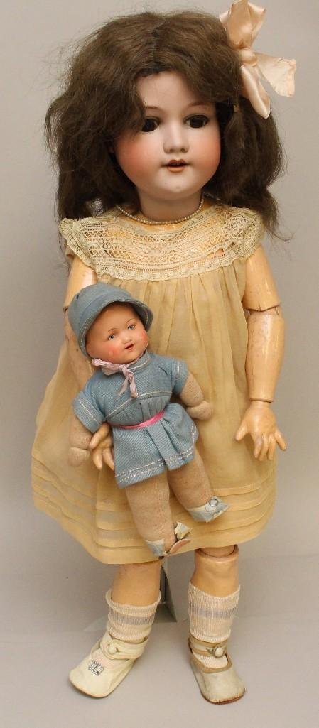 PAIR OF ARMAND MARSEILLE ANTIQUE DOLLS.: 24" Made in Germany Armand Marseille 390n. D.R.G.M. 246/ 10 antique bisque head doll. Brown sleep eyes, open mouth, brown mohair wig. Papier mache ball jointed body. Dressed in vintage clothing, 