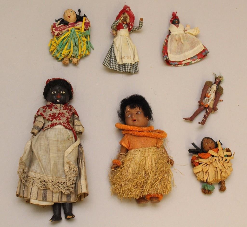 LOT OF ANTIQUE/VINTAGE BLACK DOLLS.: 7" S(PB IN STAR)H HANNA painted bisque doll with sleep eyes, open mouth, mohair wig. 5 Pc. papier mache toddler body. Dressed in original hula outfit. Condition: wax missing from (1) lid. 9"