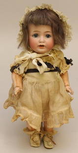 9 1/2" MADE IN GERMANY J.D.K. 260 ANTIQUE BIQUE HEAD: This is an original family owned doll. Blue sleep eyes, open mouth, brown mohair wig. 5 Pc. papier mache toddler body. Dressed in antique clothing, oilcloth shoes. Condition: nothing observed on bisqu