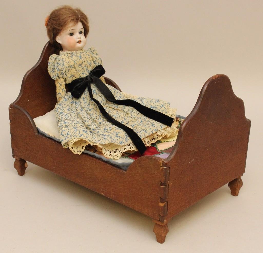 LOT: 10 1/2" AM 3700 AND WOODEN DOLL BED MADE IN 1870 (1 of 3)