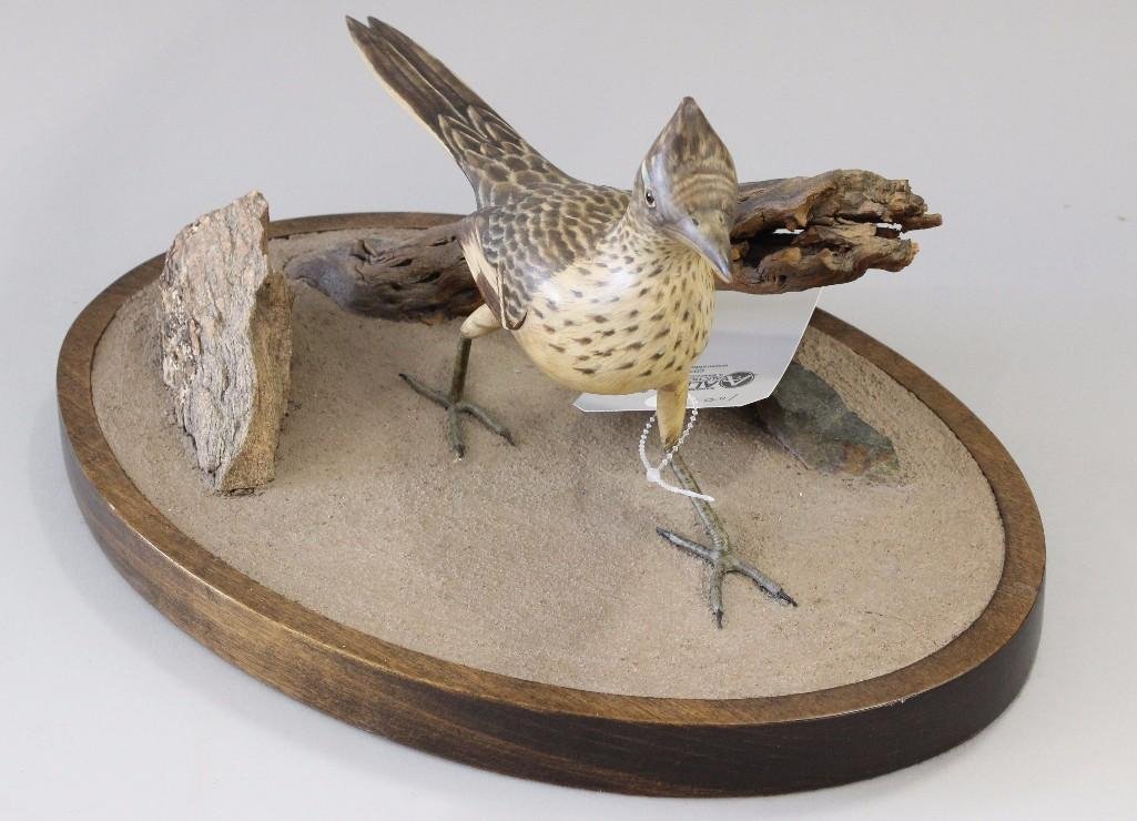 Roadrunner: Carving on desert scene base, bottom marked "AB with large M over top of letters", 80. 12" long, 15" oval base