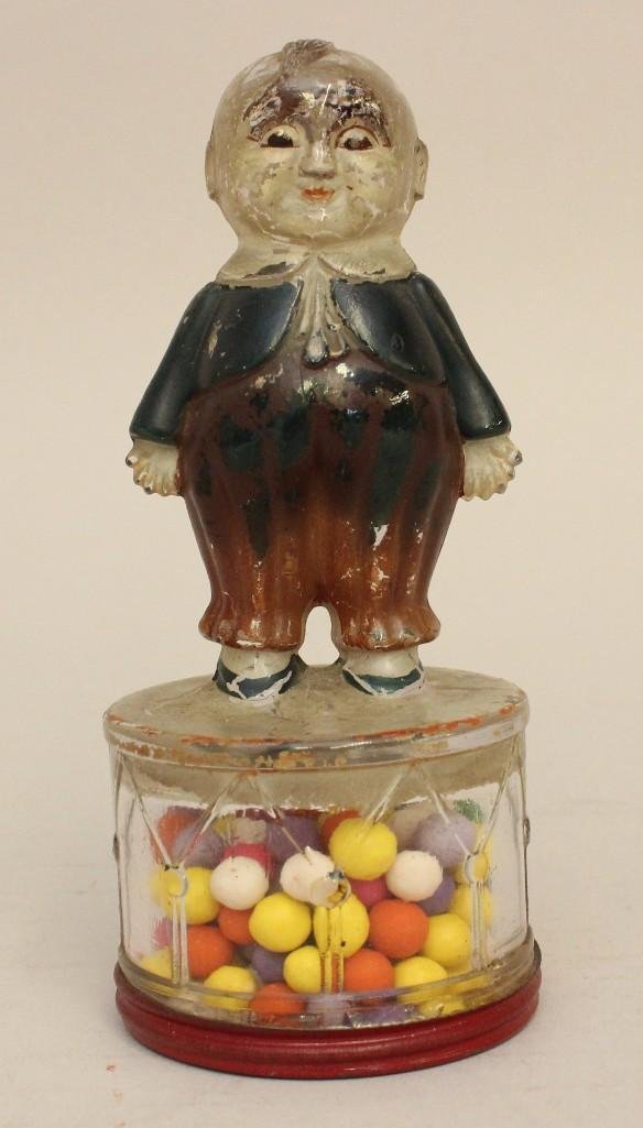 Glass Candy Container of Boy on Drum (1 of 2)