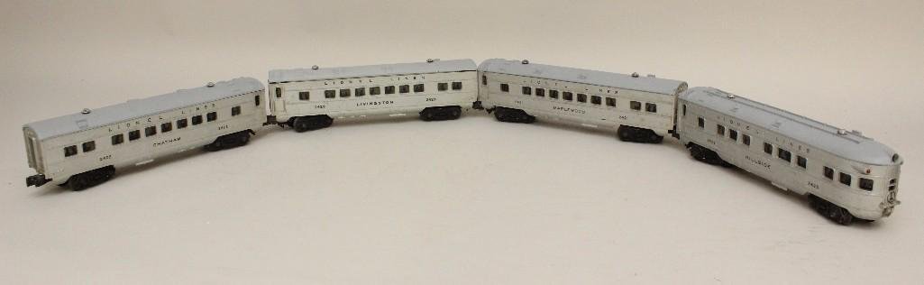 Lot of 4 Lionel Cars: Pullman car #2429, Chatham car #2422, Maplewood car #2421, Hillside car #2423.