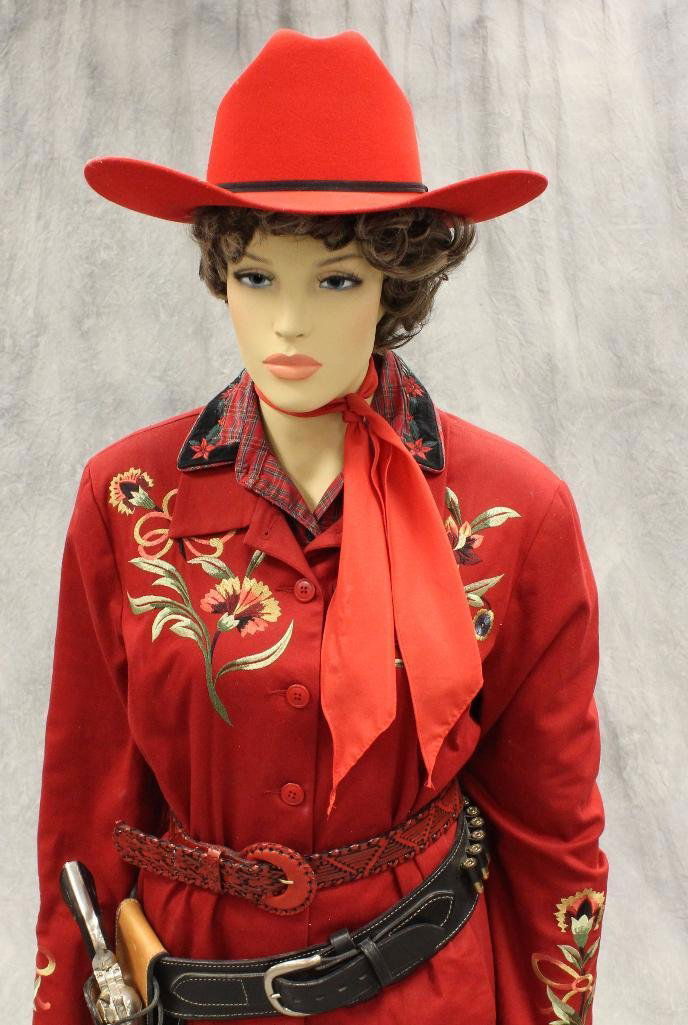 "Annie Oakley" Mannequin with Replica Pistol: Includes cowgirl hat, garments and boots, Collectors Armoury, Bat Masterson holster and replica pistol with black rubber grips. Approximately 6' tall.