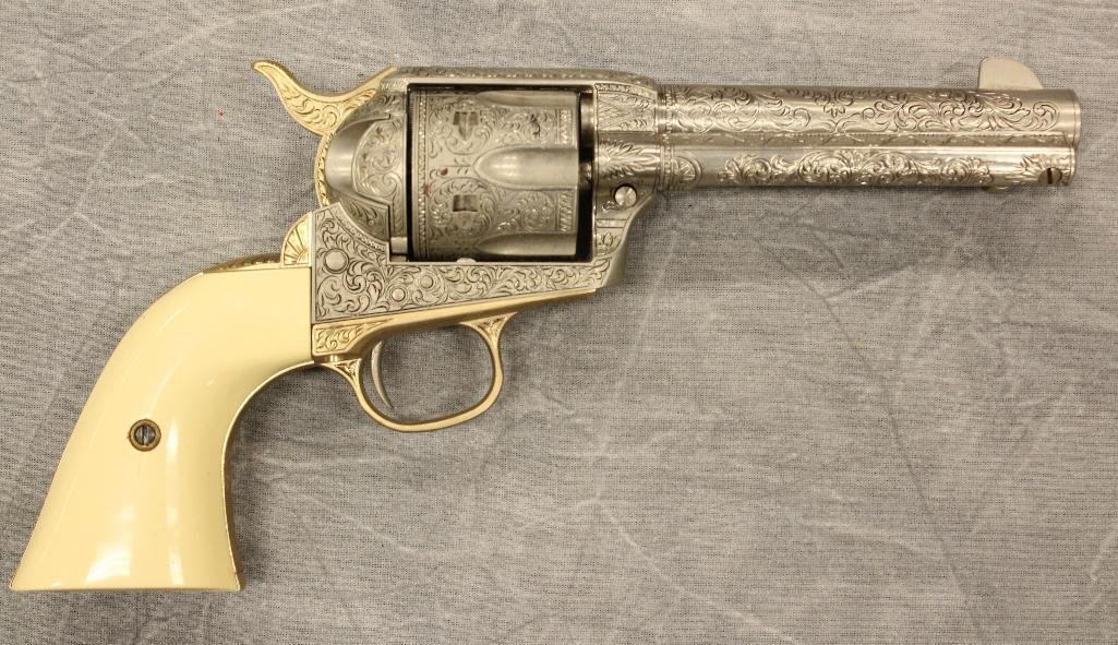 John Wayne Franklin Mint Replica 45 cal Colt Pistol: Engraved Franklin Mint eagle grip 4 3/4". 