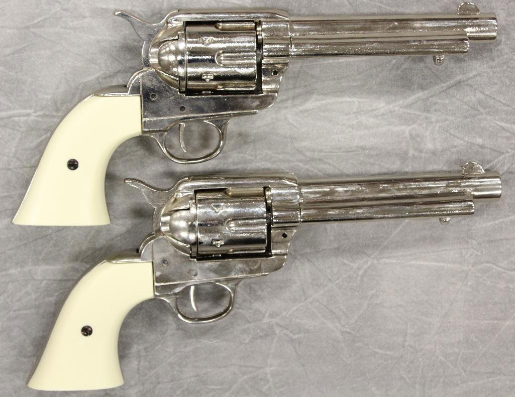 Pair of Replica Collectors Armoury 1873 Western: Faux ivory grips. 