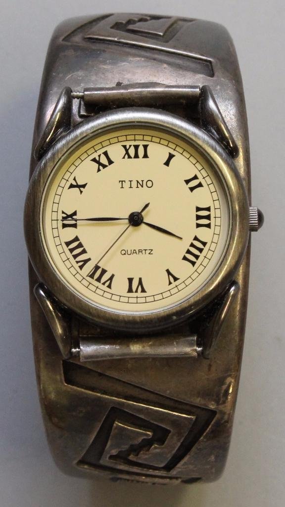 Native American Zuni Cuff Bracelet Watch by TINO: Sterling silver with Quartz movement.