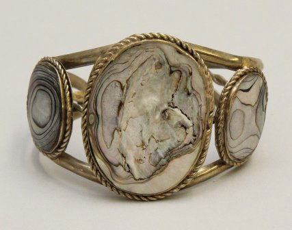 Native American Alpaca Cuff Bracelet: Abalone. Measures 2 1/4" wide and 1 1/4" opening. Marked "Alpaca." 32.1gtw.