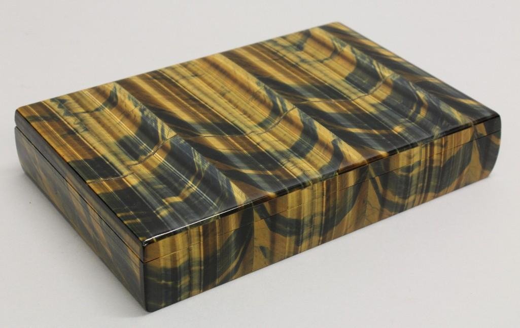 Asprey of London, Marble Box: Marble cut and highly polished box. Tigered marble with deep blue, green vains and contrasting umber coloring. Inside lined with marble, cream, tan with orange highlights. Stable piano 