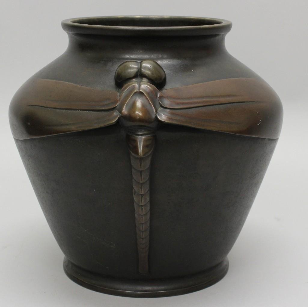 Japanese Bronze Dragonfly Jardiniere: Bronze jardiniere marked on underside. Beautiful minimalist design of a large dragonfly on either side, in place of handles, with wings spanning across the body of the piece. 8.75"h x 10.5&q