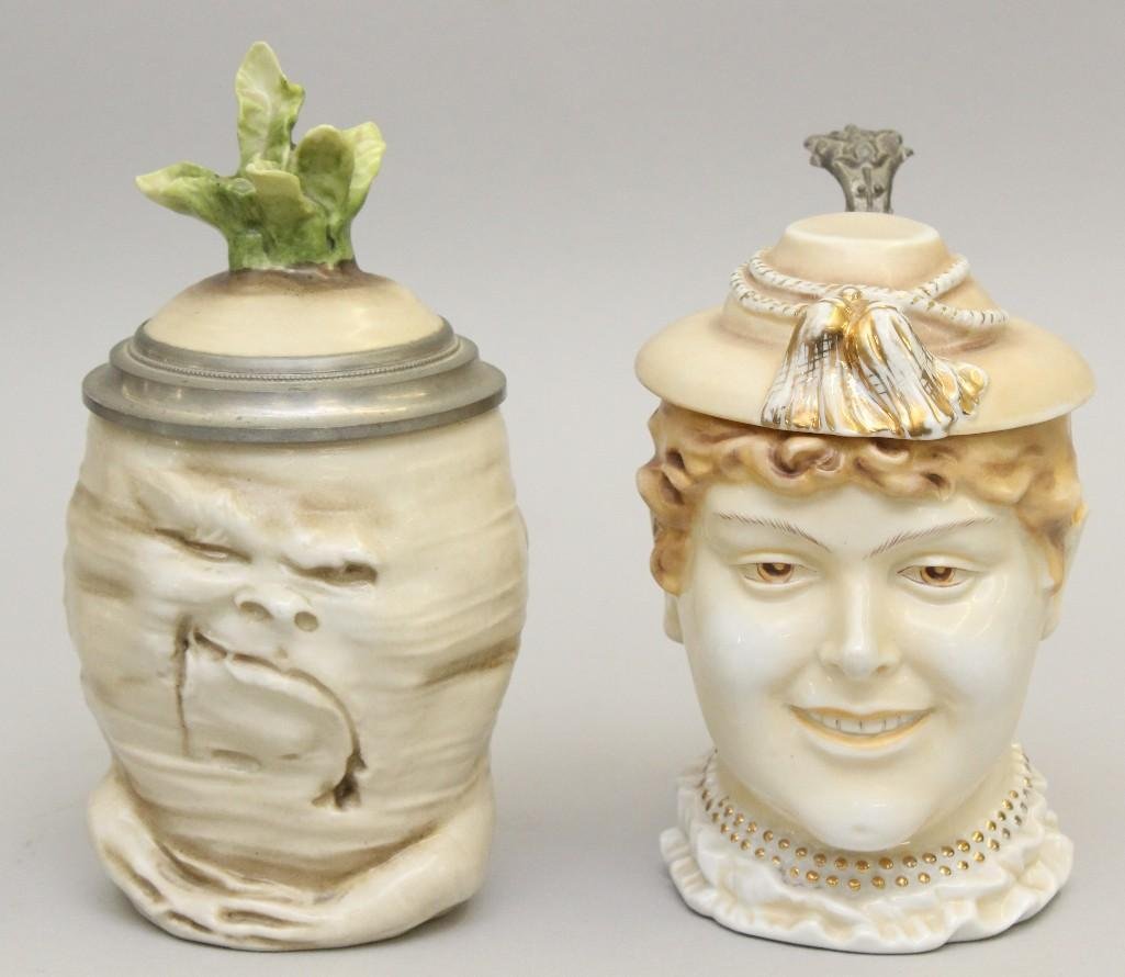 Pair of Musterschutz Steins: Two Musterschultz steins featuring faces. Marked "Musterschultz" on underside. 6.25"- 7.5"high