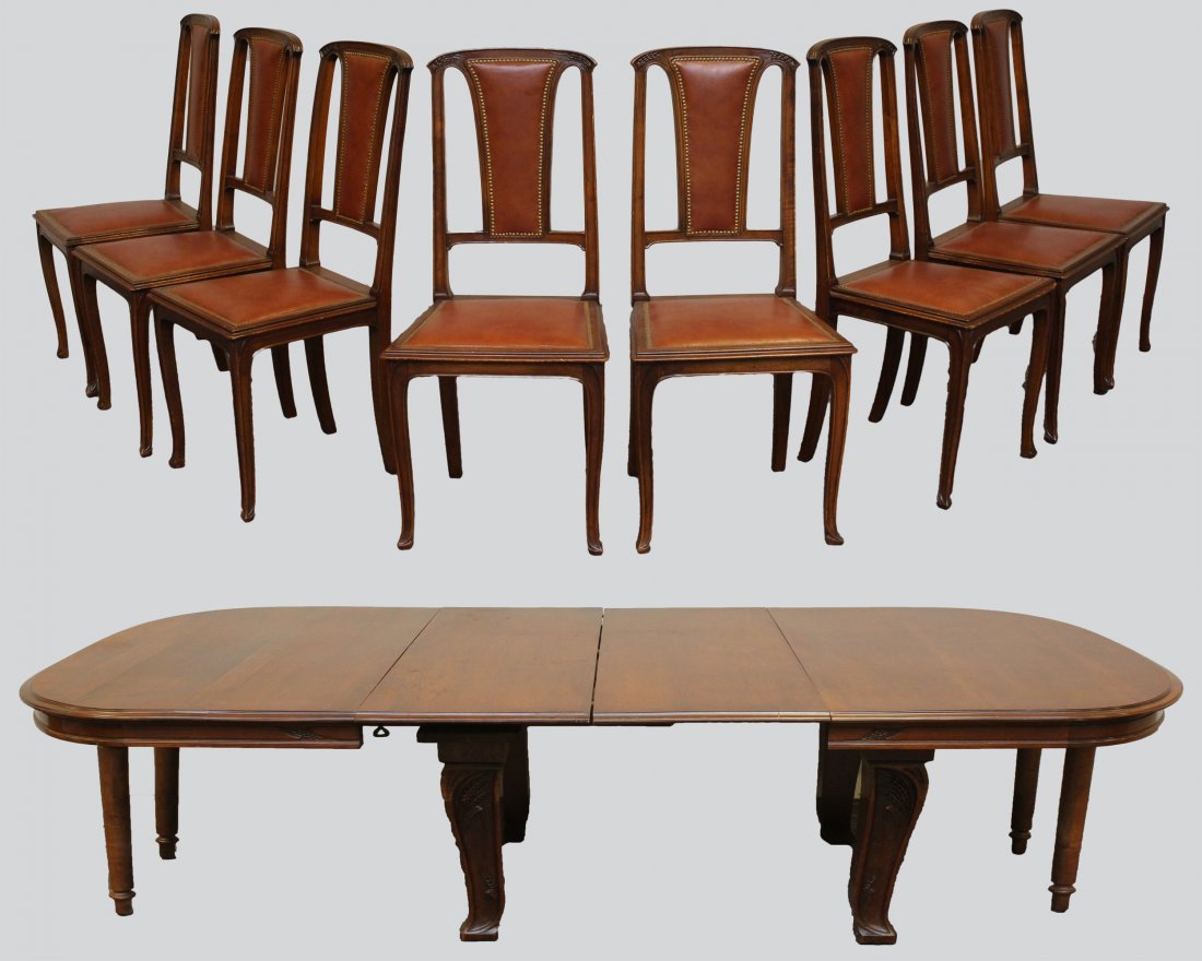 Attributed to Edouard Diot (9) Piece French Art Nouveau: (1) Extension dining table, capacity for 4 table leaves, only includes 2, 14" leaves, 29.5"h x 48"w(115" full extension) x 47"d. (8) Dining Chairs with carved crests, leather splats and seats, 39.5"h