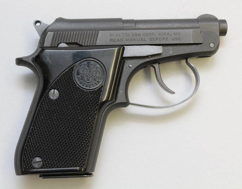 Beretta Model 21A Bobcat semi-automatic pistol.: Cal. 25. 2.4" bbl. SN DAA228774. 99% matte blue finish on metal, bore is dirty but appears good, black plastic grips no handling marks and 1 - 8 round magazine. Very good. 16-1182. NOTE: Please refer 