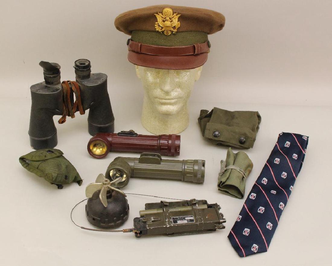 Group of Military Equipment: Grouping of misc. military equipment including; 1.)Military binoculars (missing one eye cup), 2.) Pair of military style flashlights (US MX-991U and MX212 A/U), 3.) US Army sewing kit, 4.) Pair of Fir