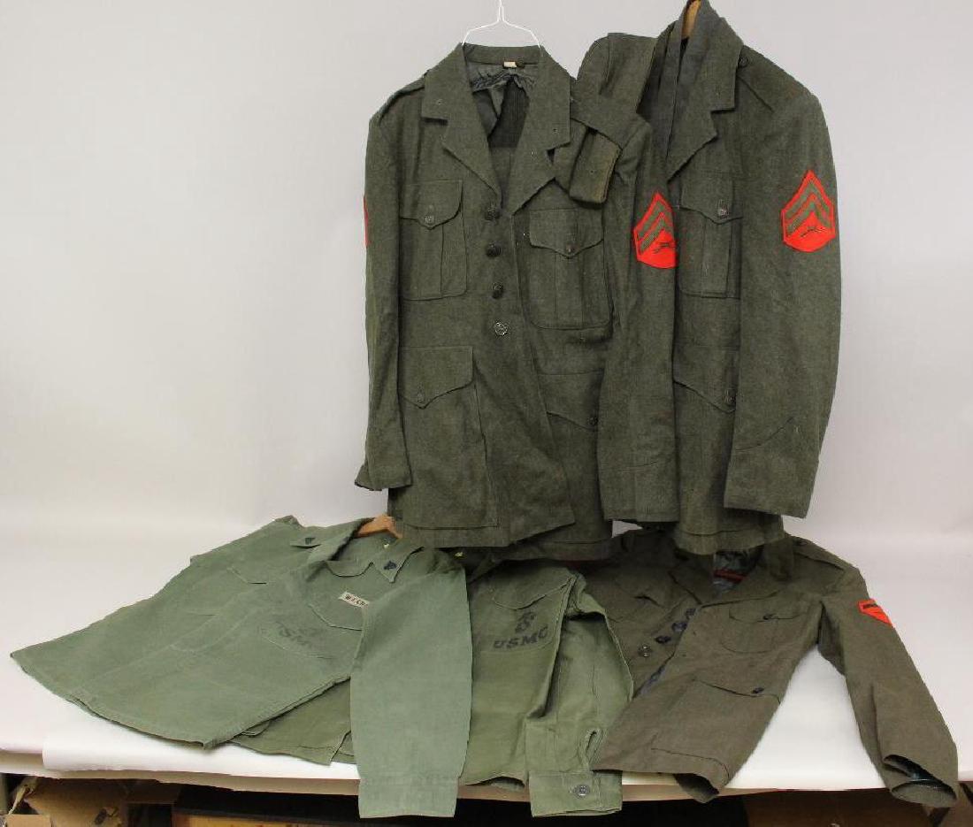 Marine Corps Uniform Grouping: Grouping of Marine Corps uniforms including 3 coats and 2 shirts. Post WWII.