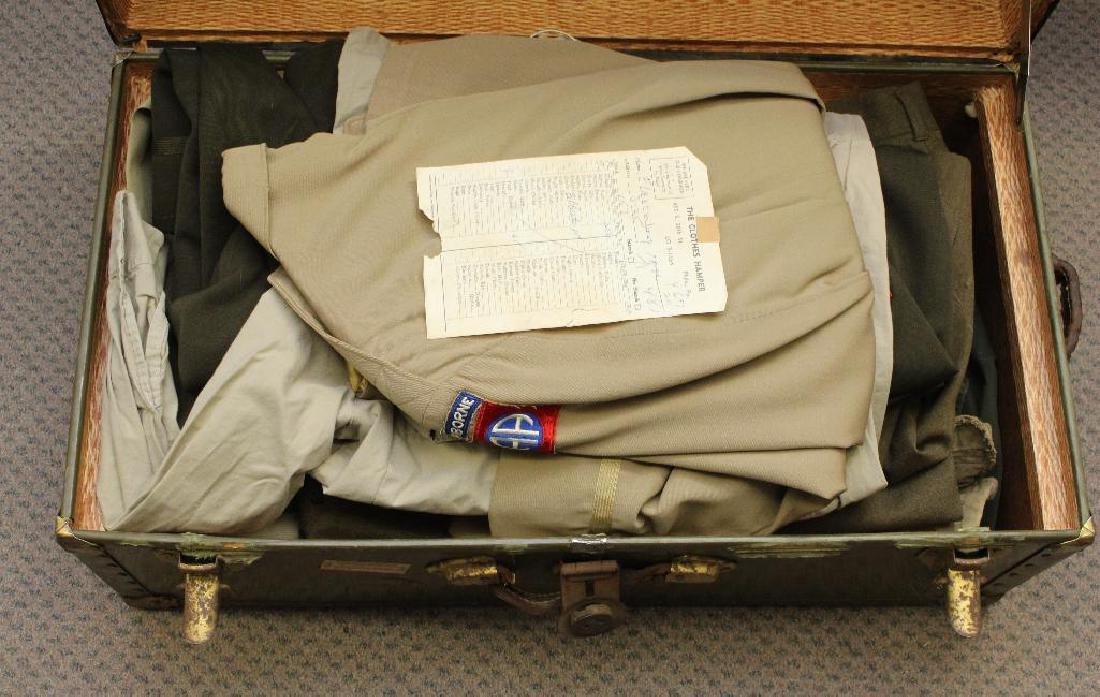 US Airborne Trunk Grouping: WWII/Post WWII Airborne trunk grouping for Eric Flaxenberg. Grouping includes; 4-overseas hats, post WWII field trousers modified to jump pants, field jacket, shirt with airborne patch, Ike jacket wit