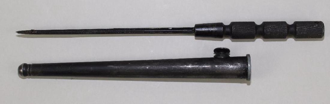 D-Day Invasion Fighting Knife: Emergency issue fighting knife used by the Allied invading armies in 1944. Knife measures 11" (cruciform blade measures 6-1/2"). Knife housed in slightly modified British Enfield bayonet scabbard. Sca