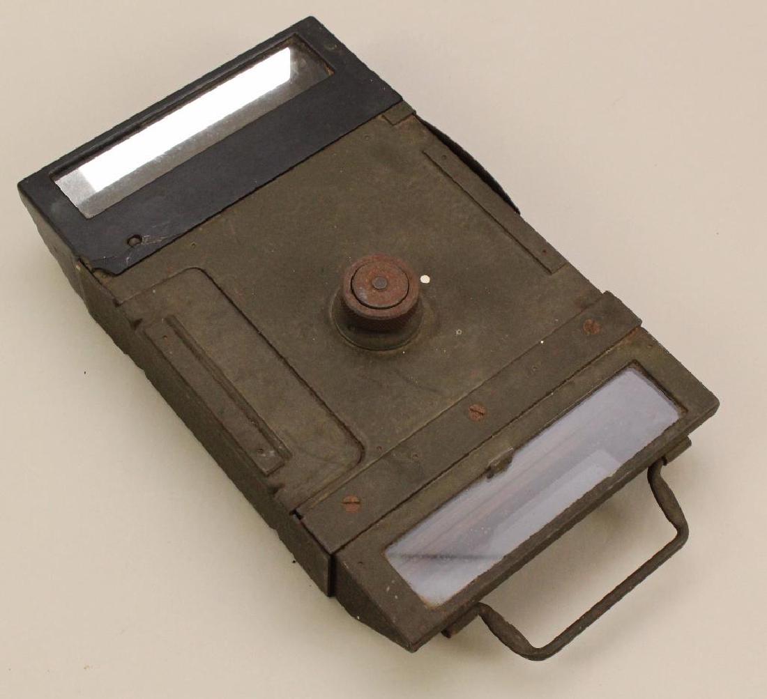 WWII US Tank Periscope: United States World War II tank periscope dated 1942. Scope measures 6.5" x 11" x 2".