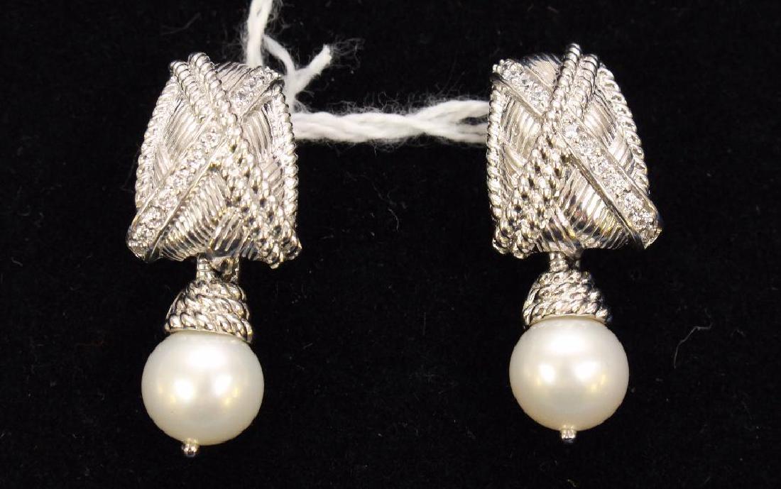 STERLING EARRINGS. JUDITH RIPKA. CZ WITH PEARL DROPS:  ONE ROW OF SMALL ROUND CZS CROSS OVER THE "X" DESIGN IN EACH EARRING. OMEGA BACK POST. CONVERT TO WEAR WITH OR WITHOUT THE PEARL DANGLES. 1 1/4" LONG WITH DANGLES. 14.5GTW.