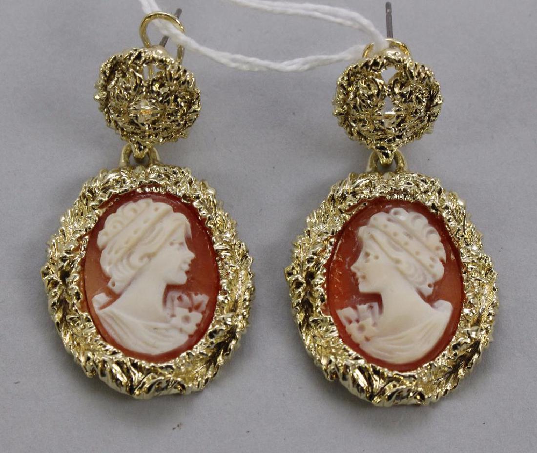 EARRINGS. AMEDEO. SHELL CAMEO: DANGLES. 20 X 15MM OVAL CAMEOS. OMEGA BACK WITH POSTS. 